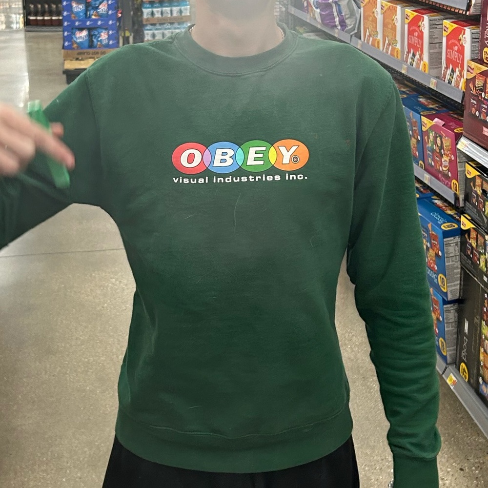 green sweatshirt